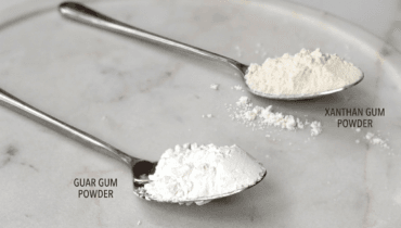 Guar gum vs xanthan gum powders shown side by side for comparison